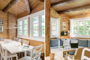 索尔图姆BL1694-Saltum-Klaus-Bjergsvej-8的客房设有桌子、沙发和窗户。