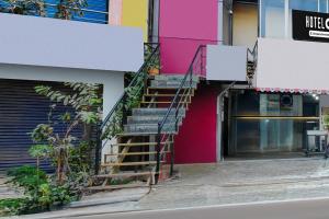 a set of stairs in front of a building at Hotel O Neredmet Road in Hyderabad +38 photos
