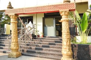 a set of stairs in front of a house at Super Collection O Godavari Kompally in Hyderabad