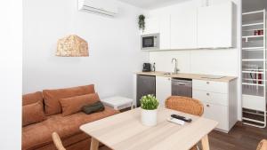 O bucătărie sau chicinetă la AG Apartamentos A Fiestra Playa de Boiro