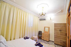 Voodi või voodid majutusasutuse DAR El Ghali toas