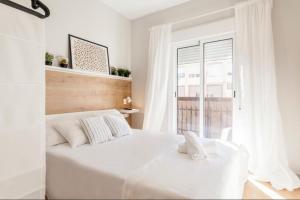 Postel nebo postele na pokoji v ubytování Marques de Caro Rooms Luxury