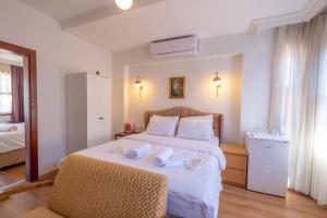 a bedroom with a bed with two towels on it at Blue Diana hotels in Istanbul