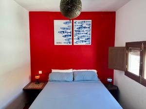 Ένα ή περισσότερα κρεβάτια σε δωμάτιο στο Casa del Encanto