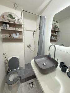 Koupelna v ubytování Aurora Apartment