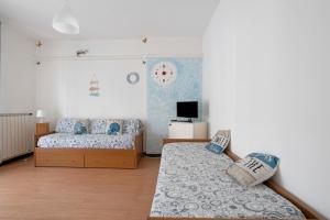 Postel nebo postele na pokoji v ubytování Porta Delle 5 Terre