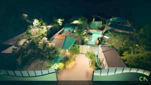 an overhead view of a house with a swimming pool at Chaparrals Surf in Dickwella