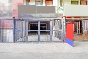 an open gate in front of a building at Collection O Tilak Nagar Near Pacific Mall in New Delhi +53 photos