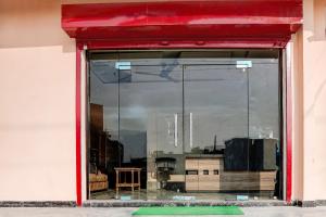 a window with a view of a city at Super Collection O Salori in Prayagraj