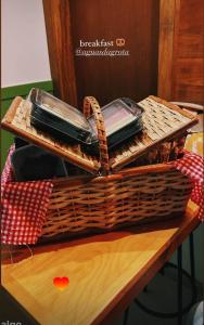 a basket sitting on top of a table at Pousada Águas da Grota - Penha - SC in Penha +23 photos