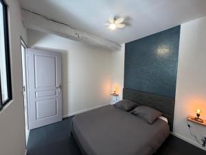 Postel nebo postele na pokoji v ubytování Gîte Les 4 Terres - Maison 1 chambre