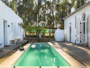 a swimming pool in the backyard of a house at White House Koringberg in Koringberg