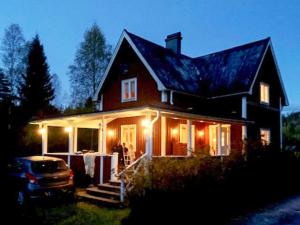 a house with lights on the front of it at 5 person holiday home in Hagfors in Hagfors