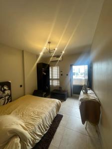 Ένα ή περισσότερα κρεβάτια σε δωμάτιο στο Ikoyi Luxury 2BR Apartment gym and indoor pool +6 φωτογραφίες