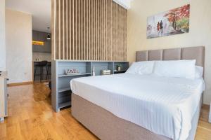 Giường trong phòng chung tại Princess Milena Apartments - Apartment Milena
