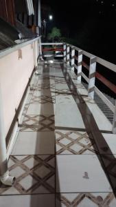 Μπαλκόνι ή βεράντα στο Chalé Campos do Jordão +5 φωτογραφίες