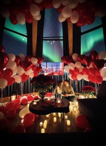 a room with red and white balloons and a table at Heavenly Houses - Niebiańskie Domki in Jaworzynka