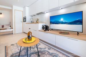 Photo de la galerie de l'établissement Maison Outhera - Studio, à Orcières 5 autres photos