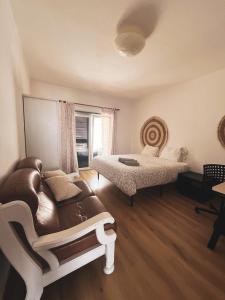 Ένα ή περισσότερα κρεβάτια σε δωμάτιο στο Philip's Beach House