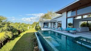 an image of a house with a swimming pool at Suan Serenity Villa in Koh Samui