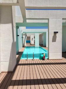 a rendering of a swimming pool in a building at Exclusive and Secure Apartment Parque Arauco Las Condes in Santiago