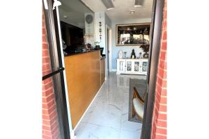 a view of a kitchen from the inside of a house at Lake Seminole Inn in Sneads