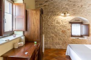 Een badkamer bij La Muraglia Residenza Turistica Rurale