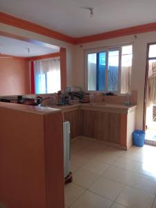 a kitchen with a sink and a counter top at Mtwapa Luxurious Residence with Pool Block 1 in Mombasa