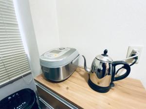 Tetera y cafetera en 優ハウス夢ハウス2階