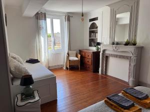 Kuchyň nebo kuchyňský kout v ubytování Appartement 1er étage dans maison de maître