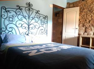 A bed or beds in a room at El Pajar