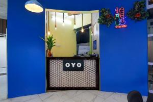 Μια τηλεόραση ή/και κέντρο ψυχαγωγίας στο Hotel O Nandhini Guest House