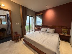 Ένα ή περισσότερα κρεβάτια σε δωμάτιο στο La Hiên boutique stay +72 φωτογραφίες