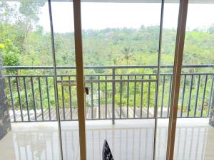 Μπαλκόνι ή βεράντα στο Cozy meadows homestays +5 φωτογραφίες