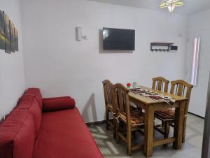 TV a/nebo společenská místnost v ubytování Apart Ruta 40