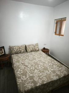 Postel nebo postele na pokoji v ubytování Dar ifoulki