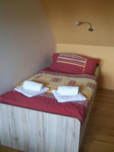Postel nebo postele na pokoji v ubytování Apartmány v Centru