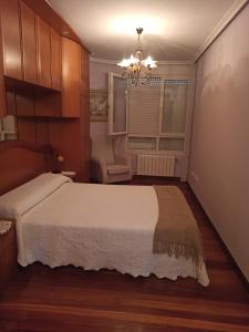 Postel nebo postele na pokoji v ubytování Apartamento Casuca + 18 fotografií