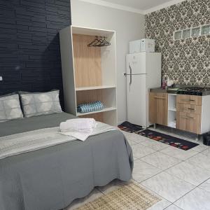 Kuchyň nebo kuchyňský kout v ubytování Aconchegante com Ótimo preço, Vem conferir!