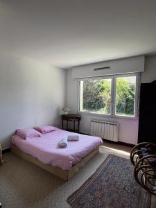 Ένα ή περισσότερα κρεβάτια σε δωμάτιο στο Villa des Perelles