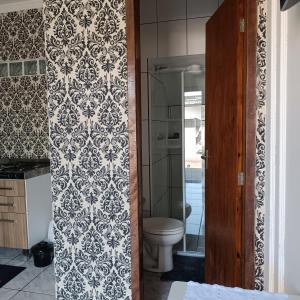 Koupelna v ubytování Aconchegante com Ótimo preço, Vem conferir! + 19 fotografií