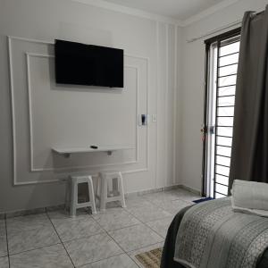 TV a/nebo společenská místnost v ubytování Aconchegante com Ótimo preço, Vem conferir!