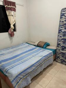 Ένα ή περισσότερα κρεβάτια σε δωμάτιο στο Residencia Yiriy