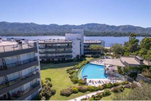 an aerial view of a building and a swimming pool at Veneto Village in Villa Parque Siquiman