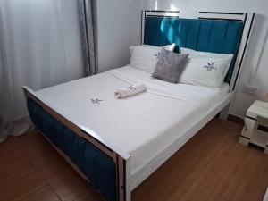 Postel nebo postele na pokoji v ubytování Bright Homes