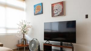 TV a/nebo společenská místnost v ubytování Casa Centrica Con Estacionamiento