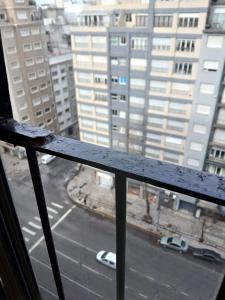 a view of a city street from a window at carmon colon 1 ambiente y medio in Mar del Plata