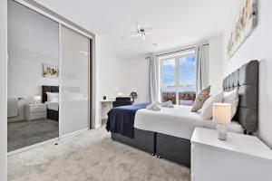 Voodi või voodid majutusasutuse Fantastic 2 bed Flat with view IG11 toas