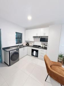 Kuchyň nebo kuchyňský kout v ubytování Urban Bleu - Boutique Apartment