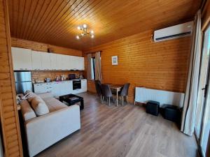 a living room with a couch and a table at Oda in Mtskheta in Mtskheta